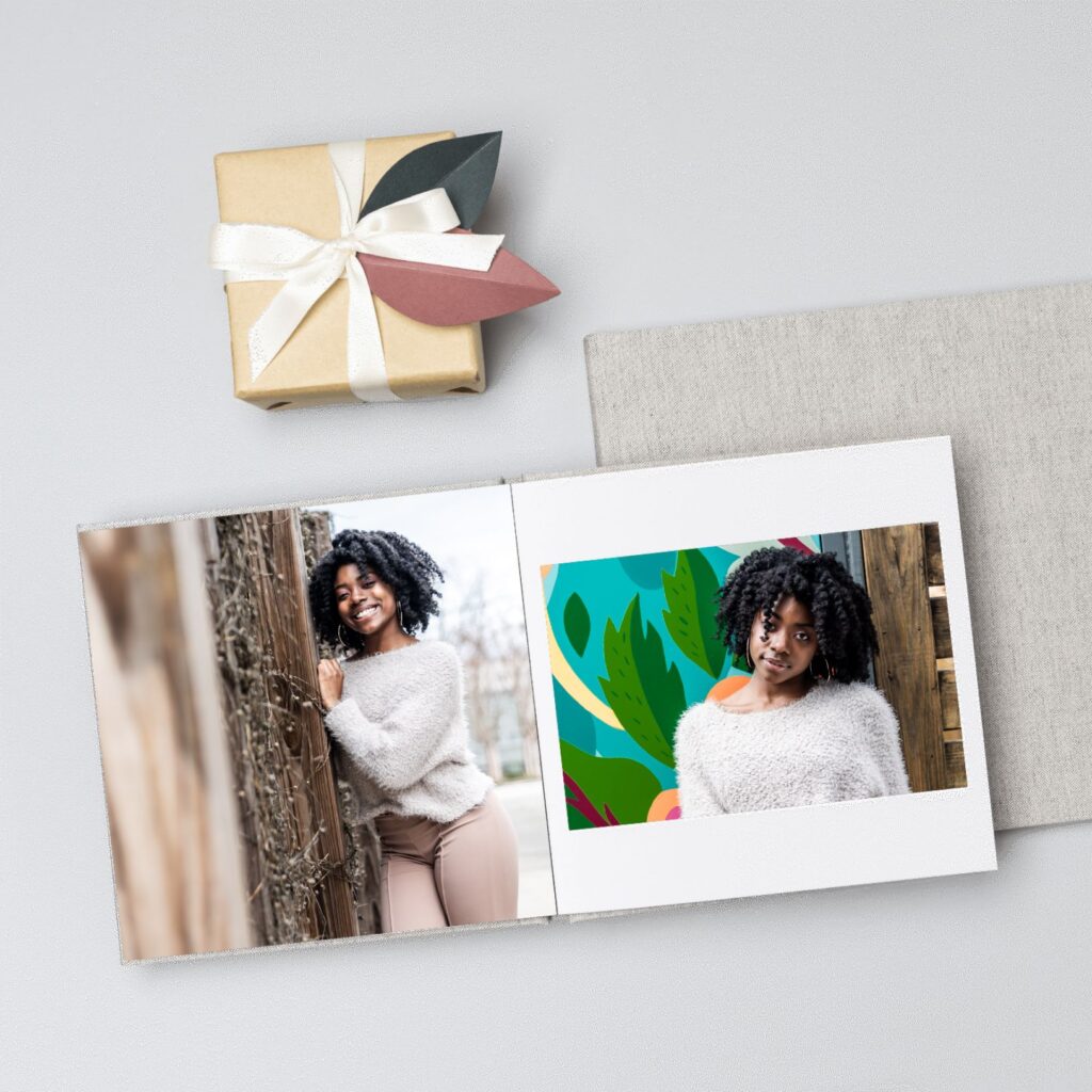 custom heirloom album of senior girl with wrapped gift and album box.
